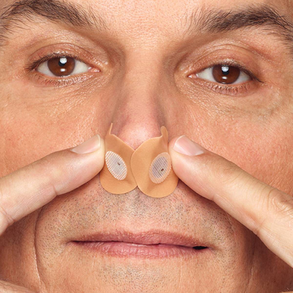 Male Wearing 2 Provent Nasal Pads
